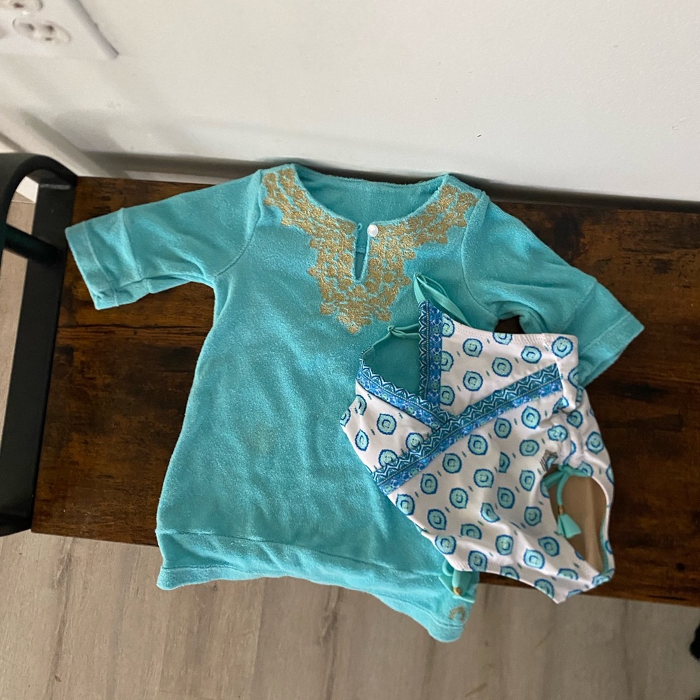 2 piece swim suit. the suit and over cover.